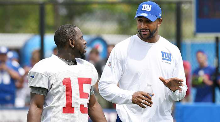 Since rejoining the Giants in 2014, Tyree (right) has become the mentor he needed often in his playing days.